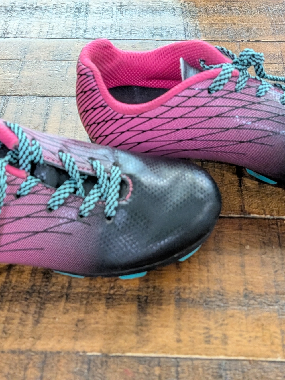 DSG Pink and Black Kids Soccer Cleats with Teal Accent Laces - Picture 3 of 5